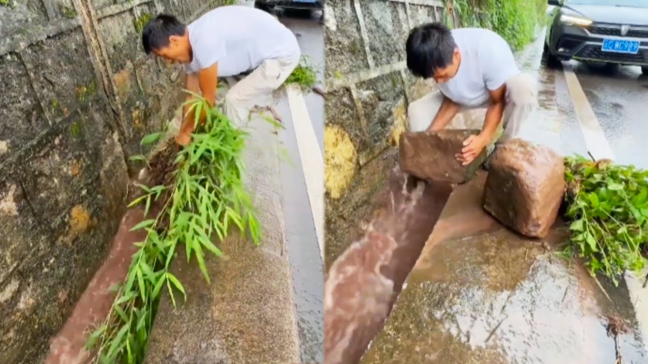 🌧On A Rainy Day, A Kind-Hearted Person Cleared The Fallen Rocks In The Drainage Ditch 