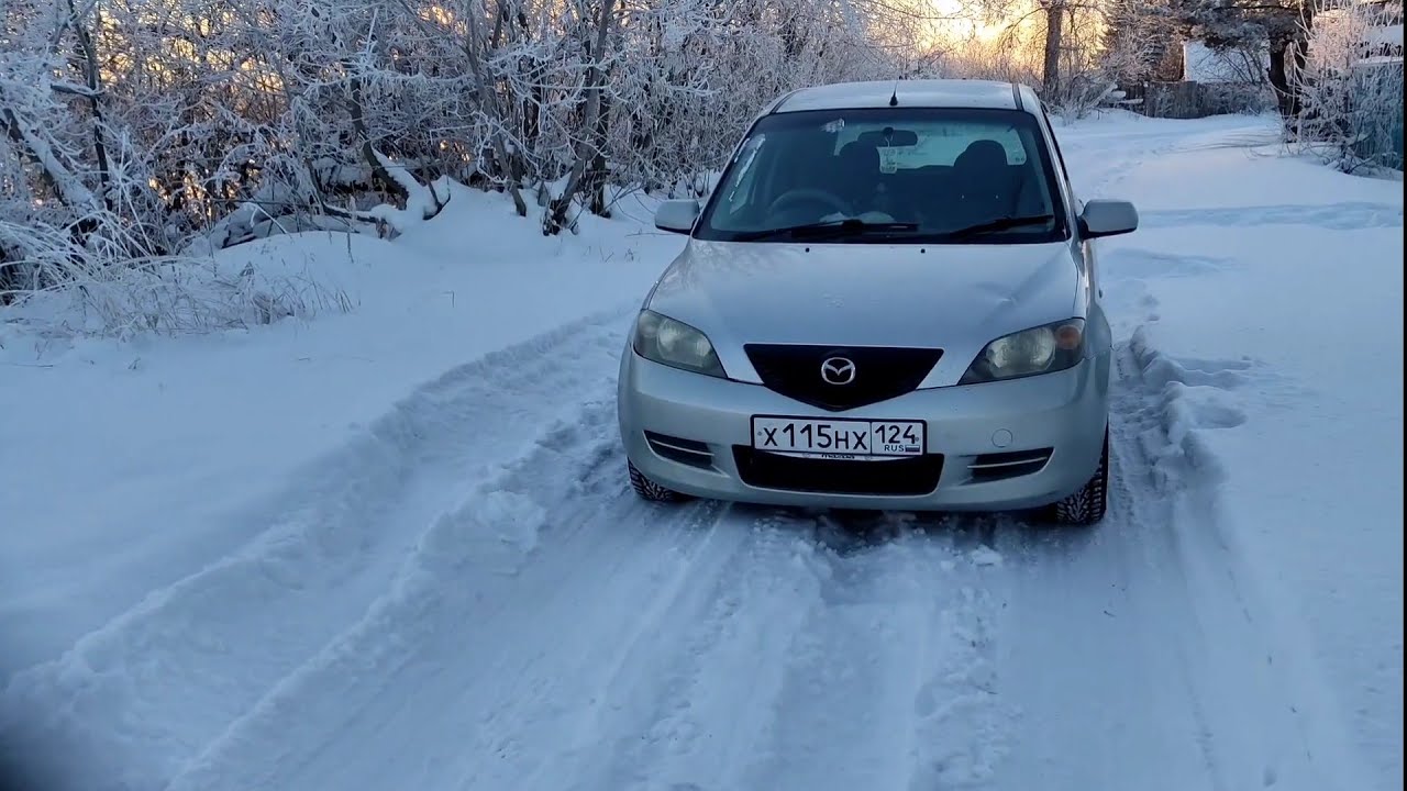 Обзор на Mazda Demio за 100K