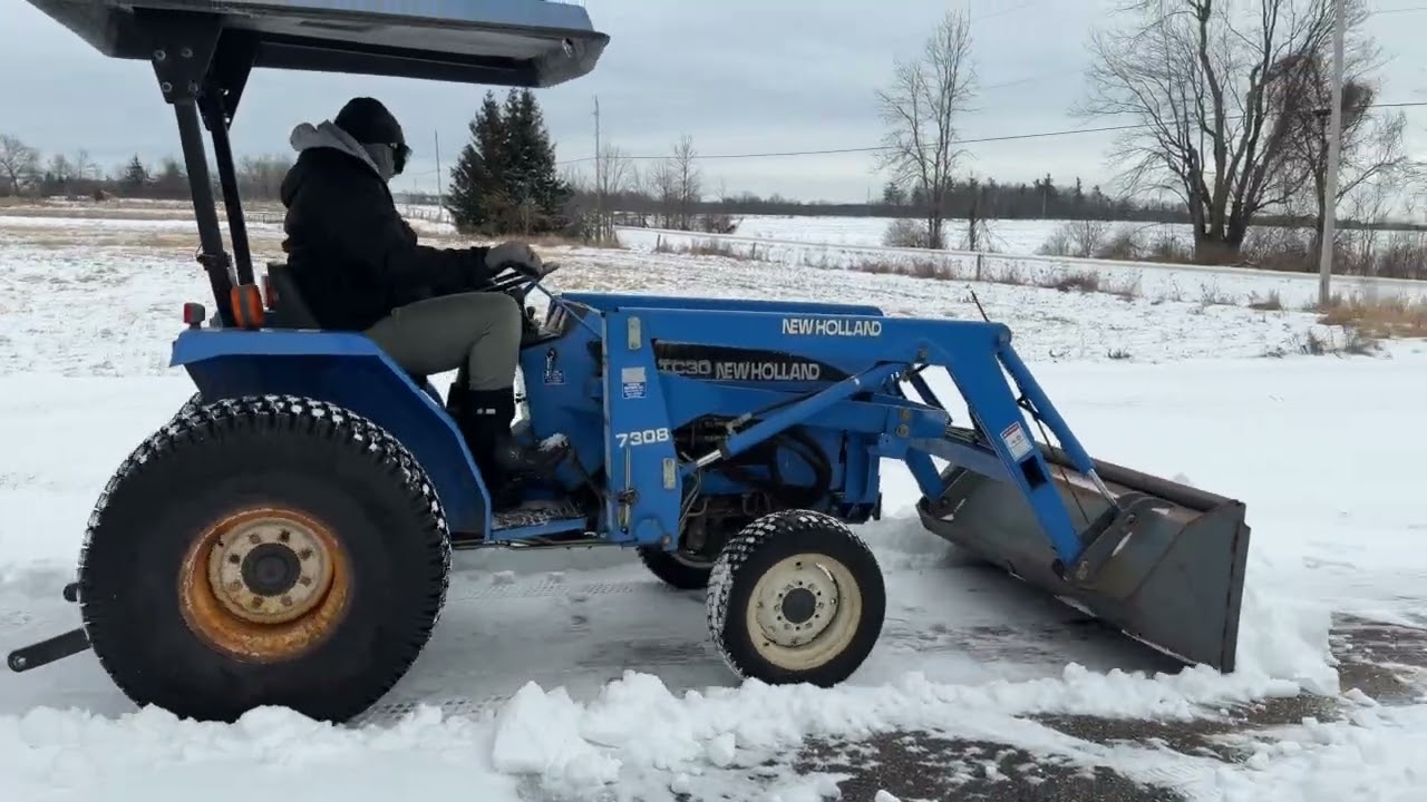 We're not in the city anymore! Here's how we plow the snow on our rural driveway.