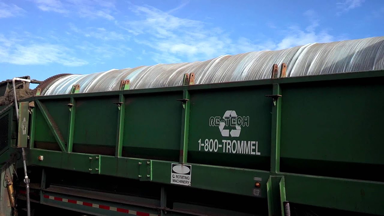 Mulch coloring with a Trommel