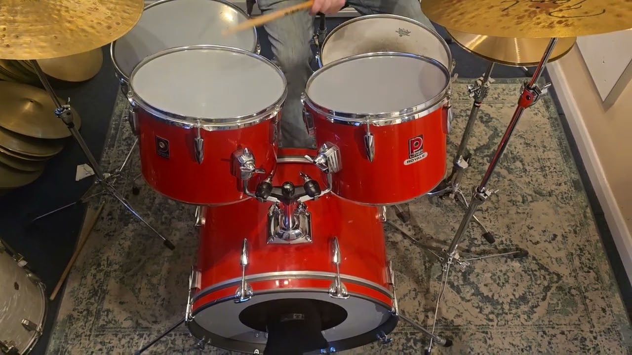 Premier Royal Concert tom Outfit in Red. Paiste Signature Dark Light 20 and 21 Mark 1 Rides. 