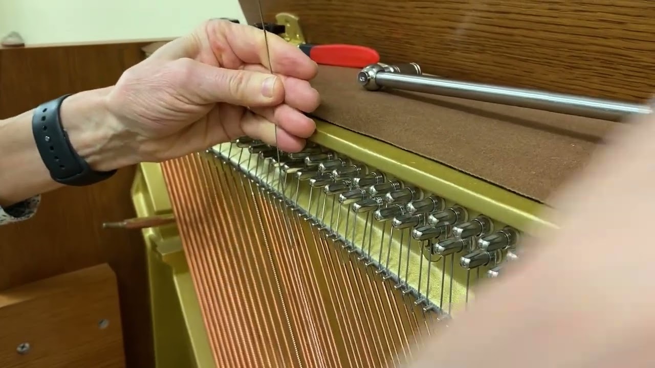 Replacing a bass string on a vertical piano