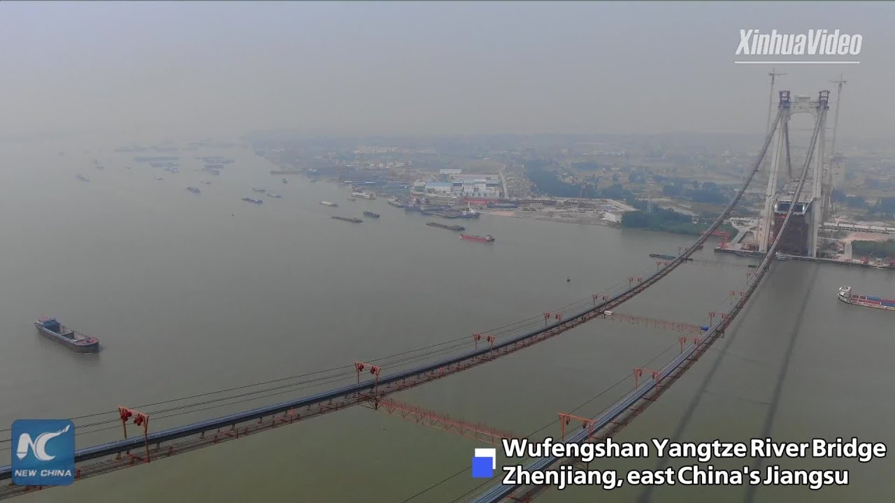 Main cables of China's first road-rail suspension bridge erected
