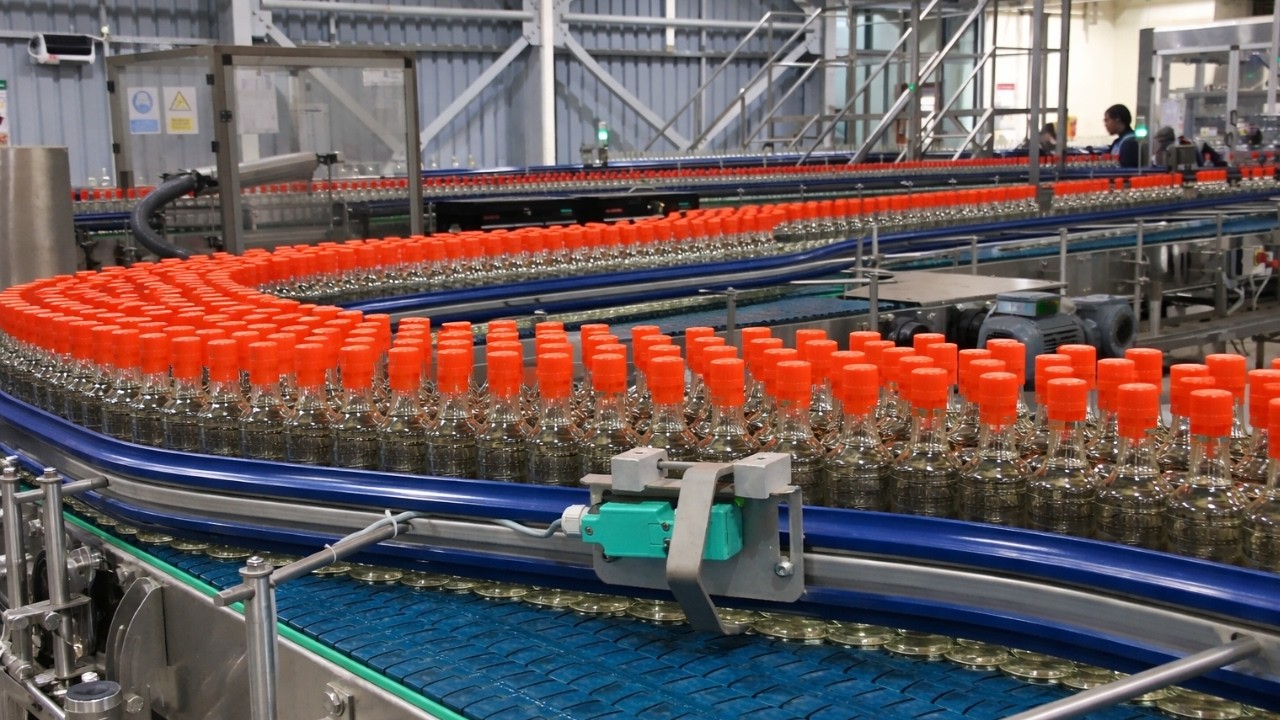 High-Speed 400 BPM Liquor Bottling & Packaging Line by ssp packaging industries