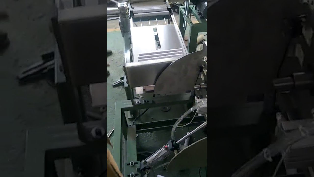 Semi automatic food film paper core packaging machine