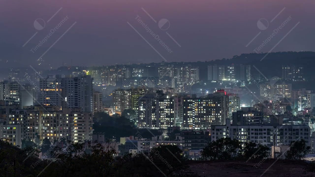 Day to Night Time lapse of City Skyline captured from a Hill, City of Pune, Maharashtra, India