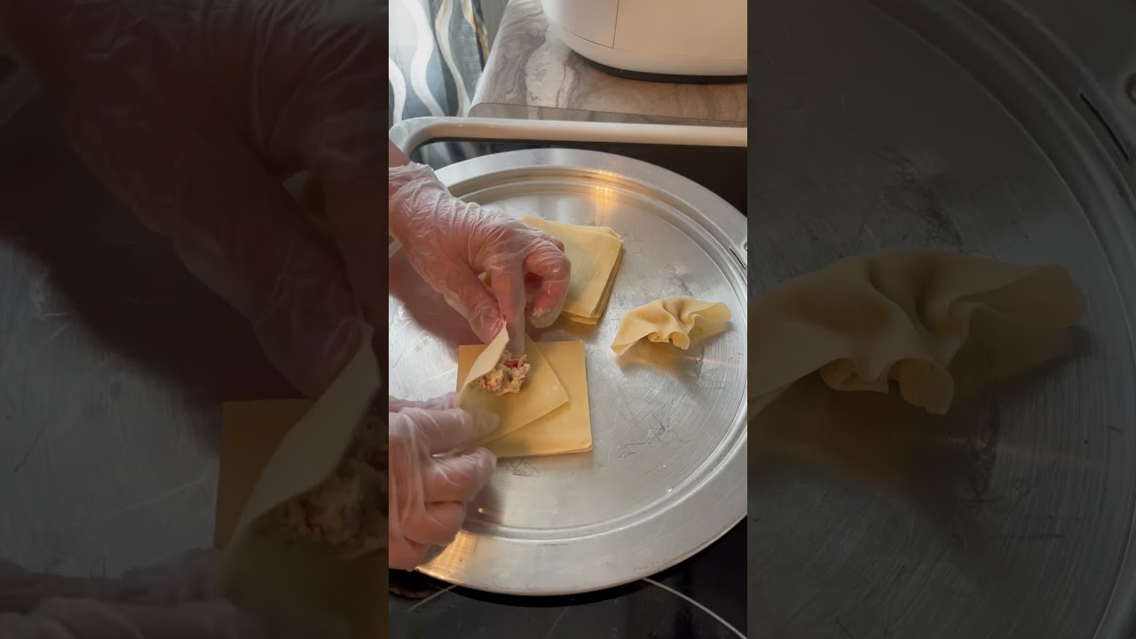 Crab Rangoon wrapping.