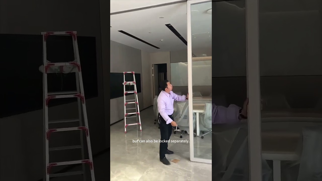 The movable glass partition door does not need to be installed on the ground track. 