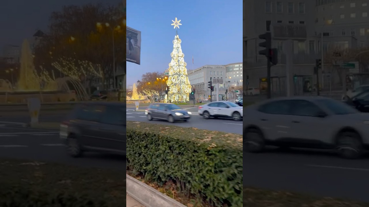 Сияющий рай: площадь Сан-Хуан-де-ла-Крус, украшенная мадридскими рождественскими красками в сумер...