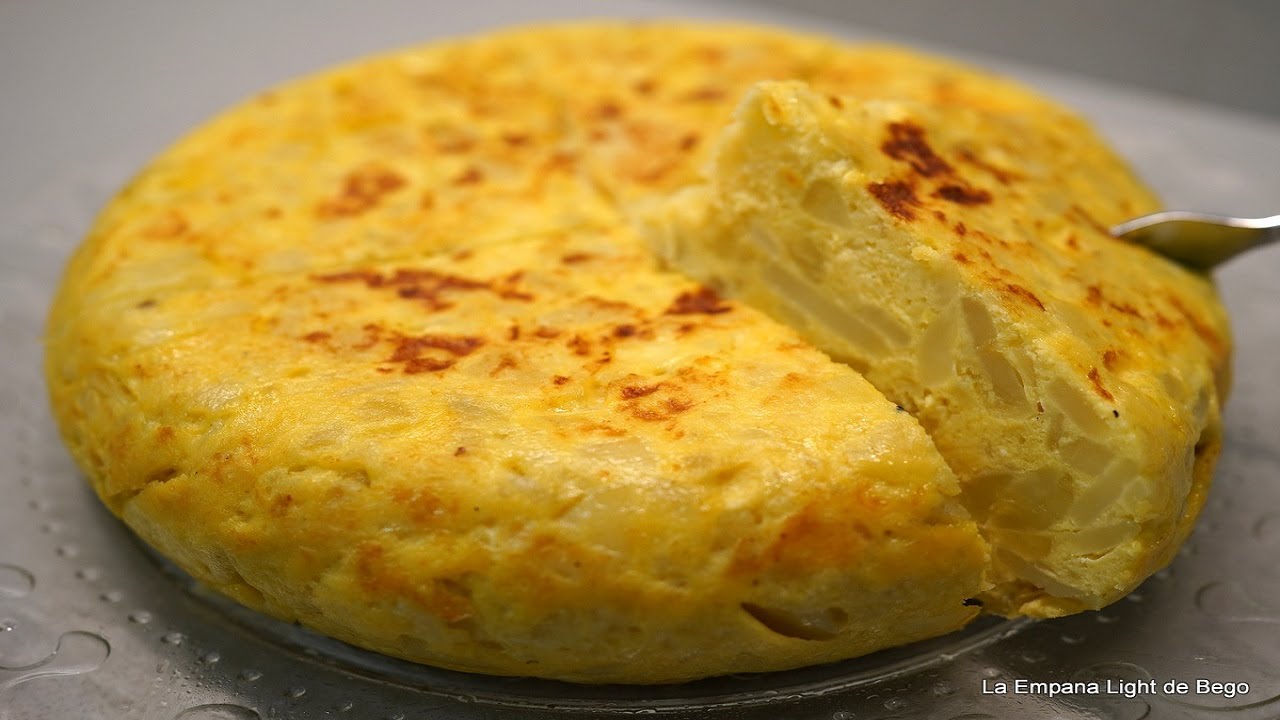 Tortilla de Patatas Con Cebolla. Receta de Tortilla Española con trucos