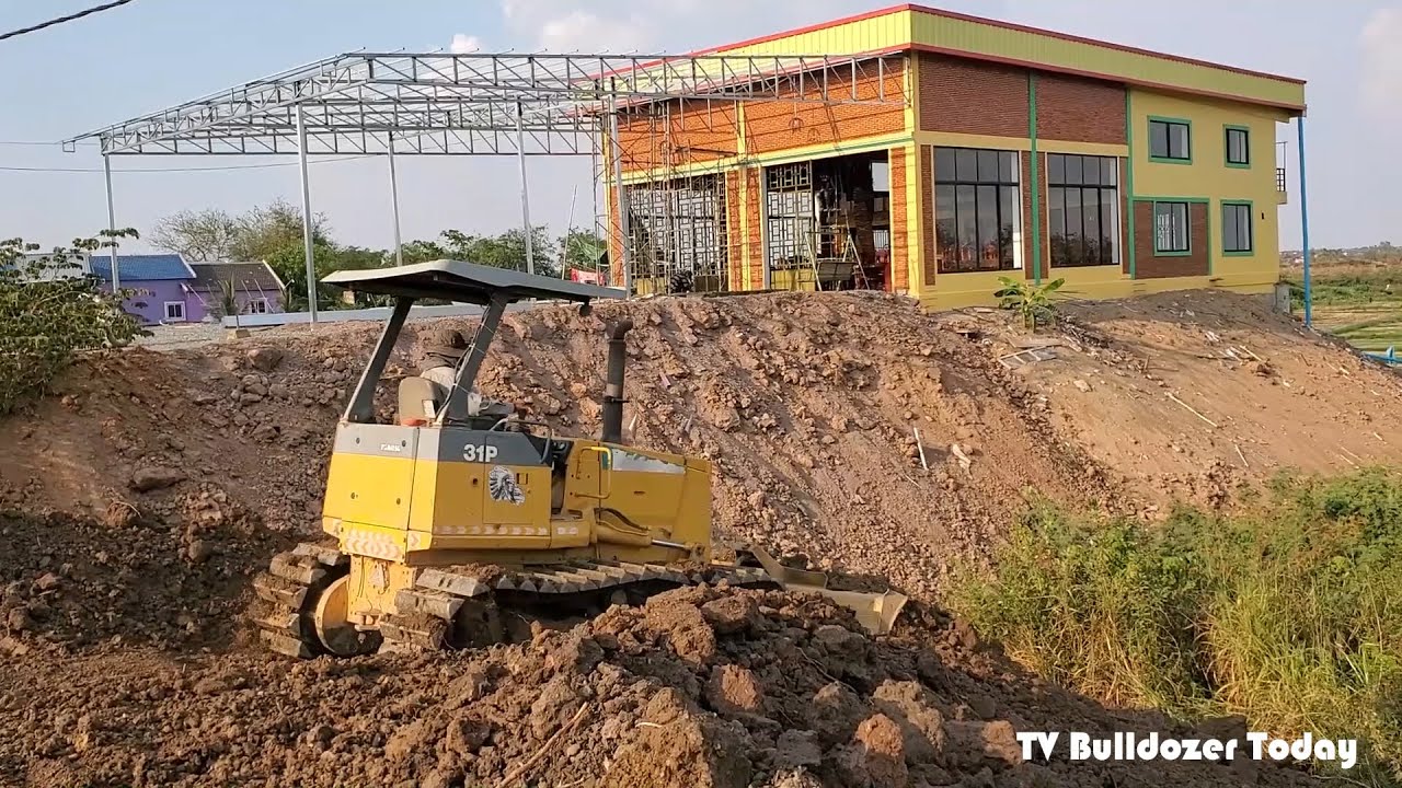 Good work activities​ New project​ KOMATSU D30P Pushes the Ground to Fill a Deep Pit​ & Dump Truck