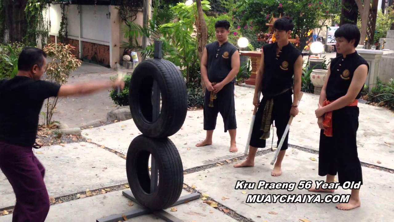 Thai Sword Training Hitting The Tire ฝึกตีเป้ายาง