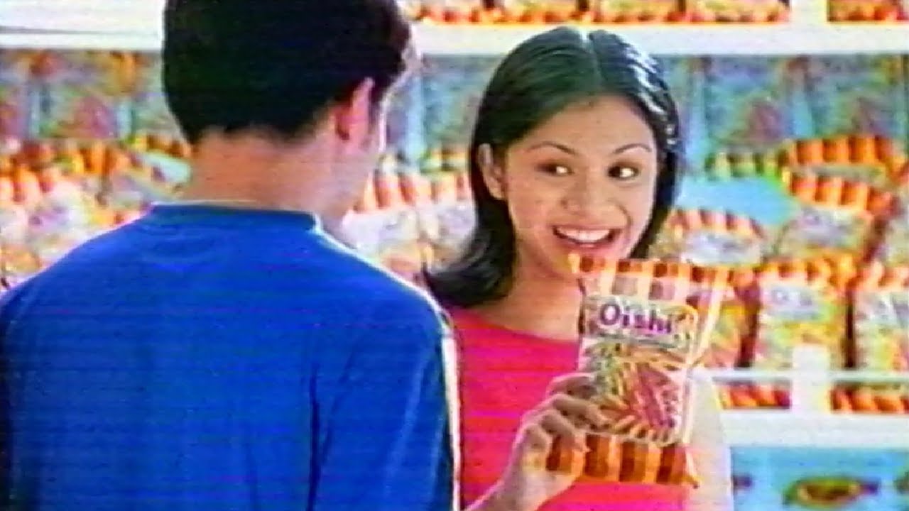 Oishi with Onemig Bondoc and Marieton Pacheco (1997)