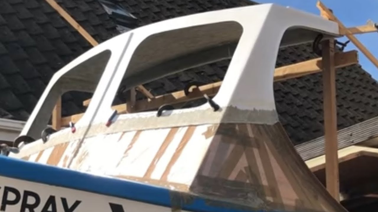 Building a fibreglass splash screen on an Orkney 23 fishing boat. Making the flange.