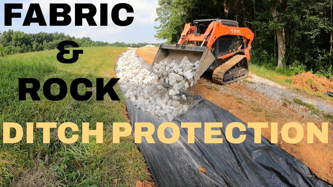 Weed Barrier Fabric & Rip Rap Rock Installed In New Driveway Drainage Ditches To Prevent Erosion!