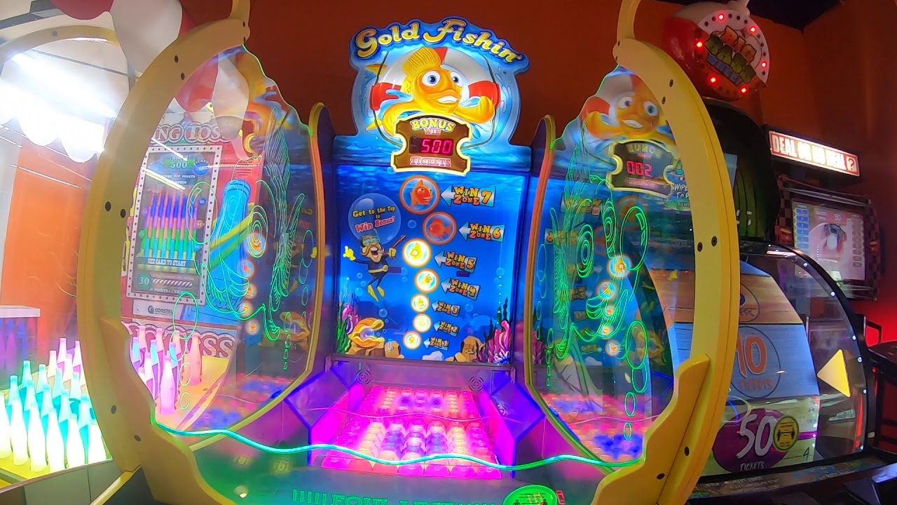 Playing the Gold Fishin' Arcade Game at Funstation Nottingham.