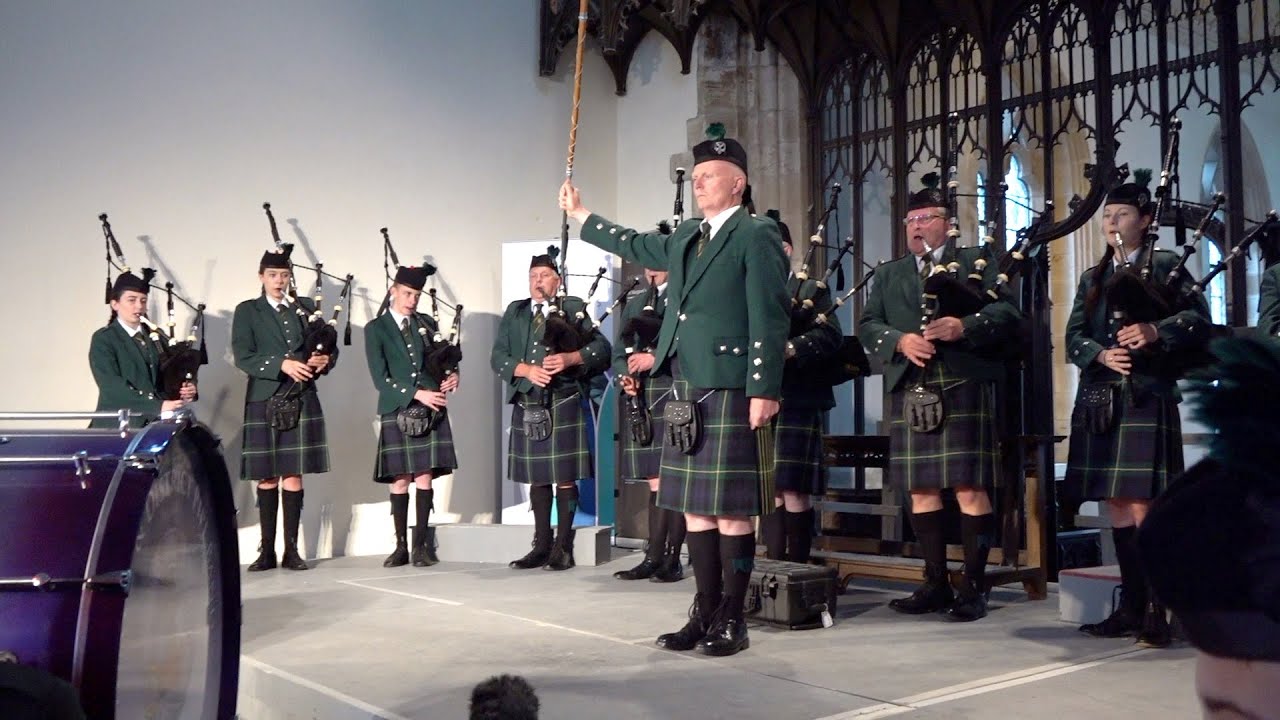 Braes of Killiecrankie performed by Huntly Pipe Band on stage during Paul Mealor concert in Braemar