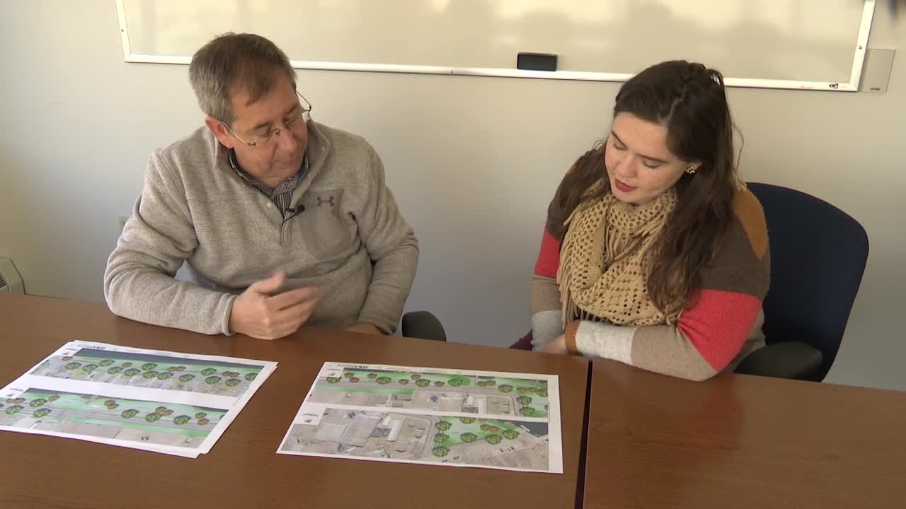 What's coming to Water Street in Menasha by the end of next year?