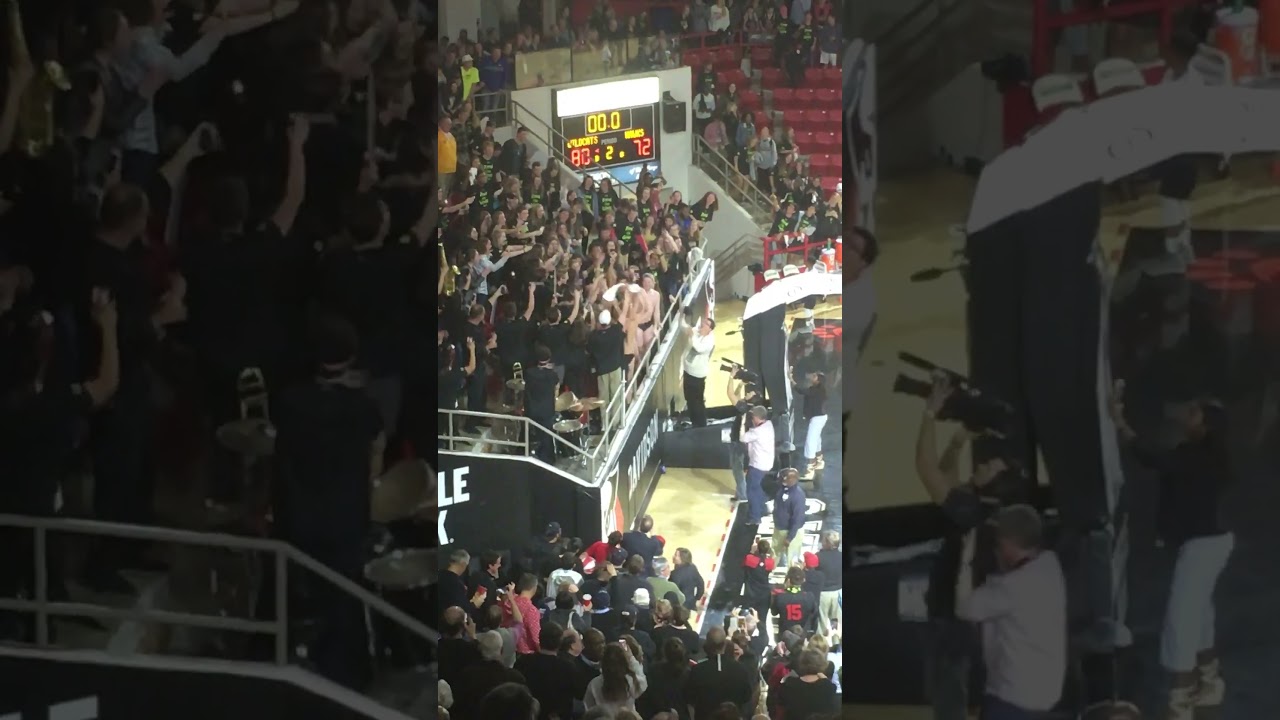 Steph Curry jumps into student section during a 2019 game at Davidson College against St. Joseph's.