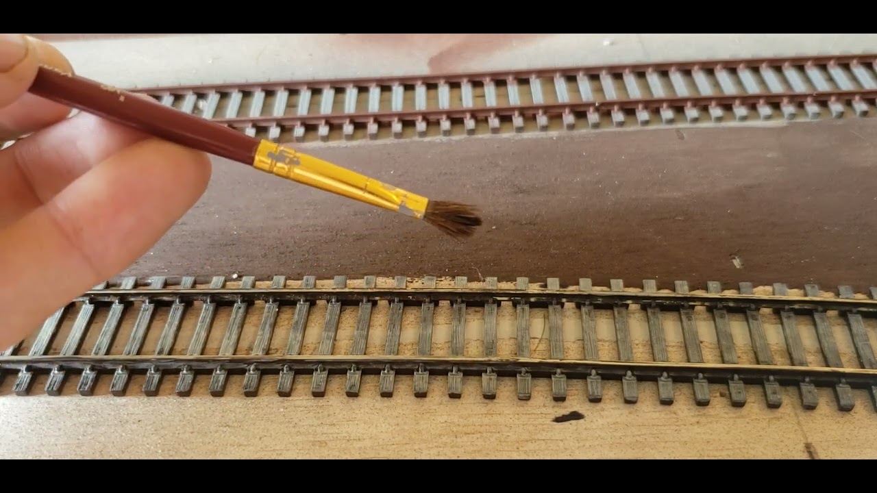 How to model and paint Realistic track, roads, and crossings in ho scale.