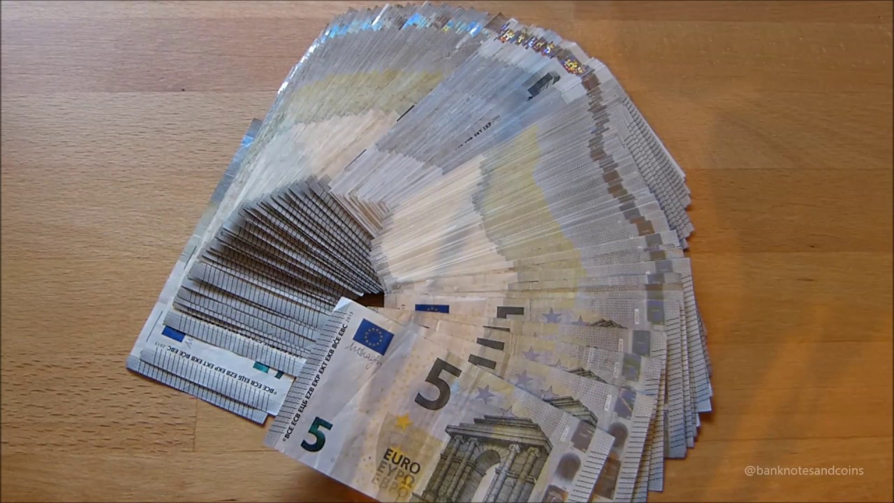 Counting Stack of 5 EURO banknotes