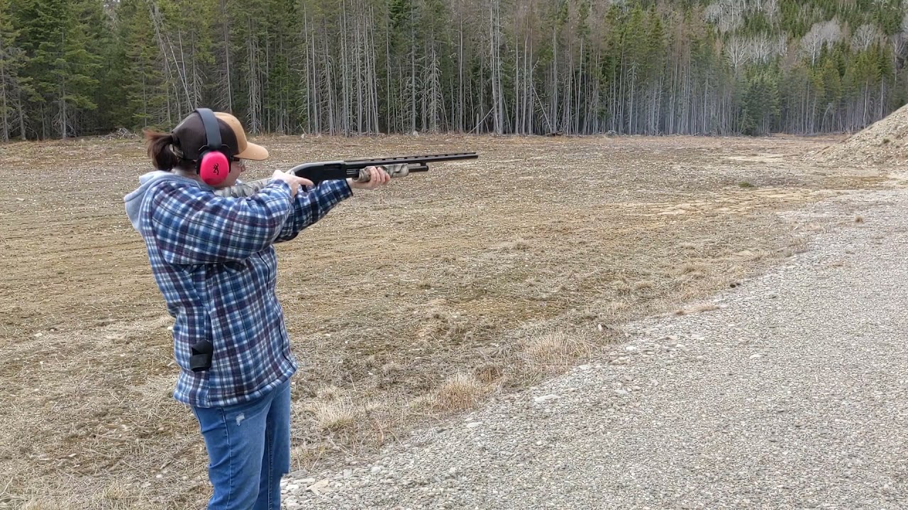 Mossberg Maverick 88 20GA Pump Shotgun at a range