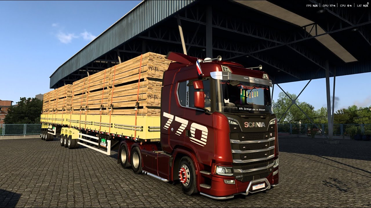 Transportando 53 toneladas de madera con camion scania