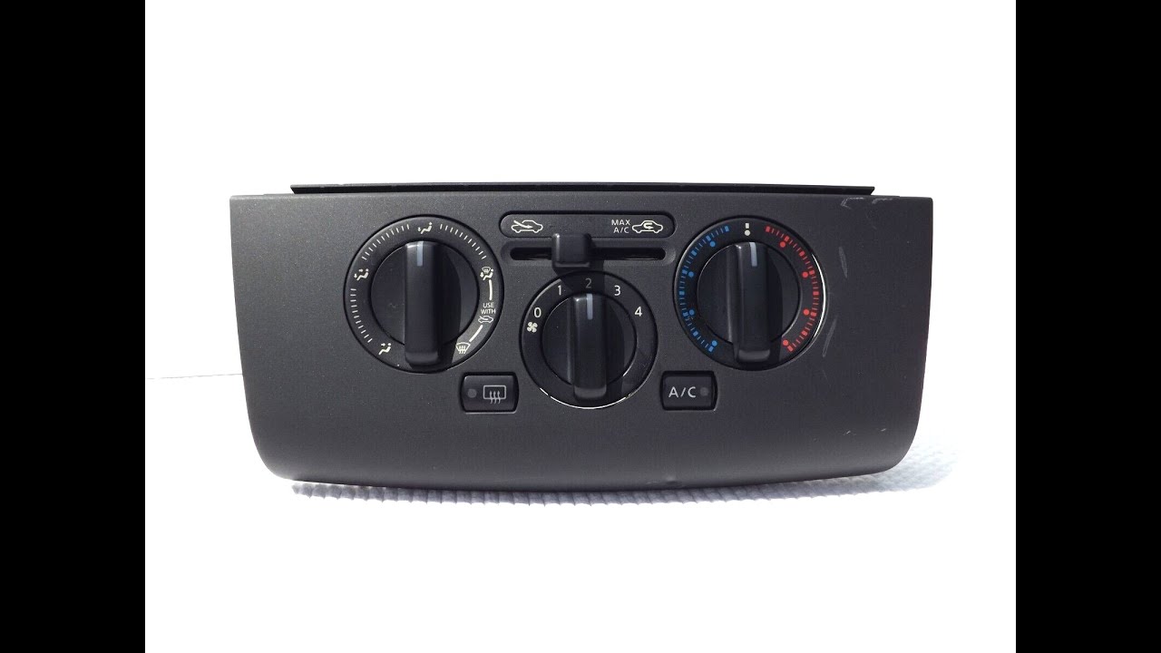 Nissan Versa heater control replacement. Removing heater control cables.
