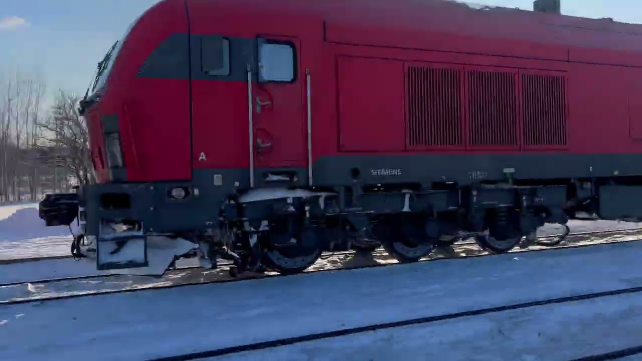 Again met two trains. Skoda Ej575 Trakai - Vilnius and Siemens Er20 freight train in Voke station.