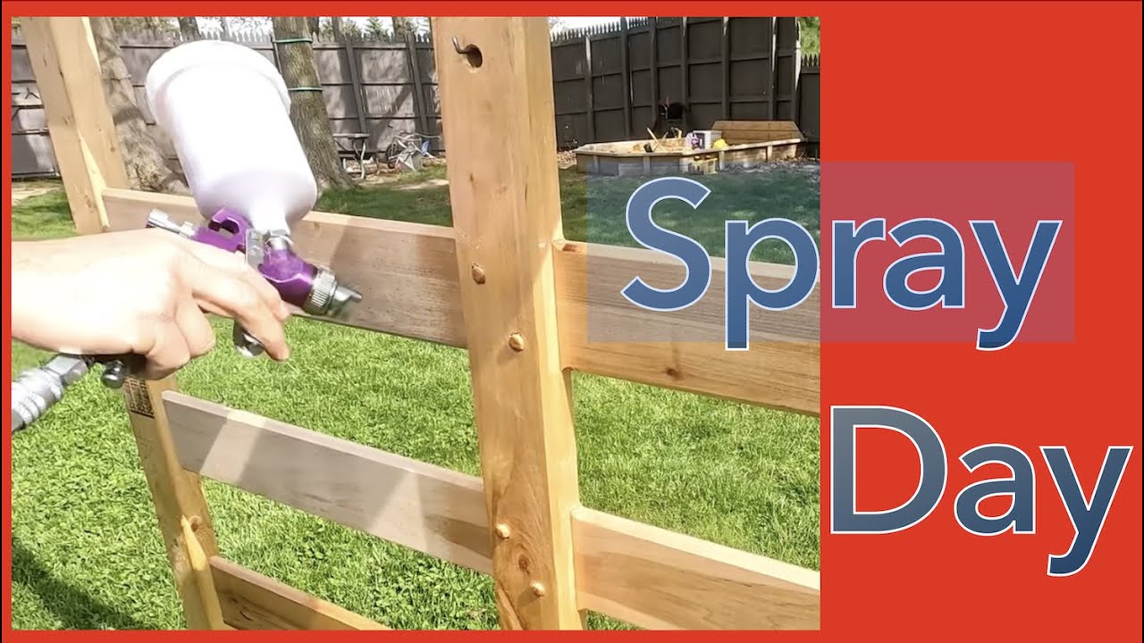 SPAR URETHANE SPRAY DAY!  Spray finishing the fence for the trailer.