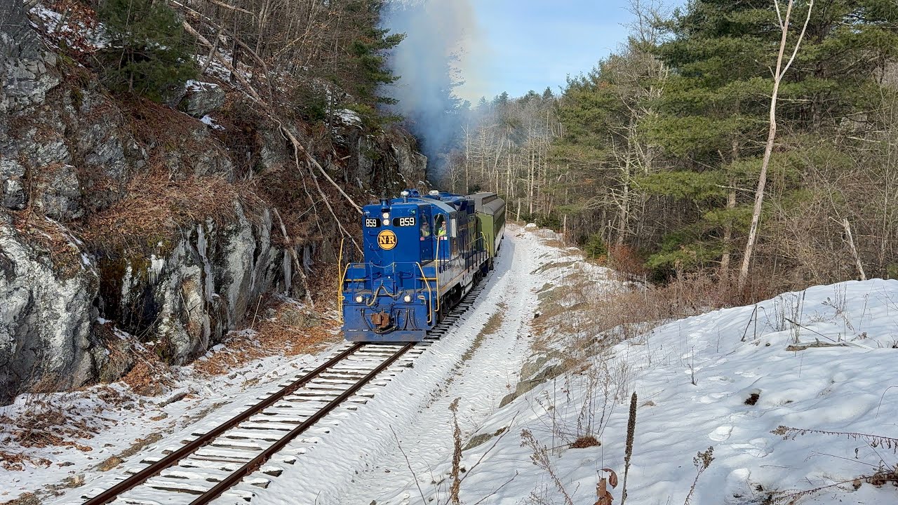 Naugatuck Railroad EMD GP9 859 in the snow with Budd SPV 1001 