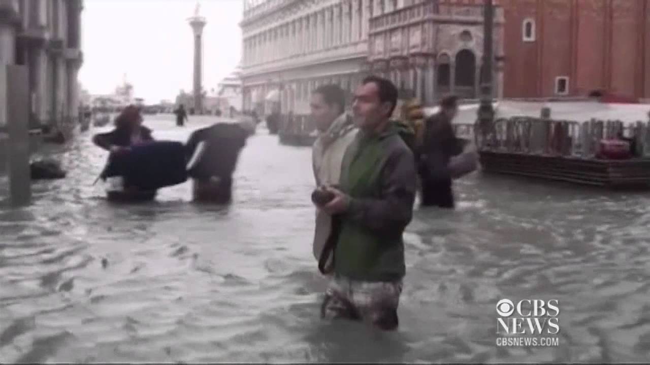 Deadly floodwaters surrounding Italian towns