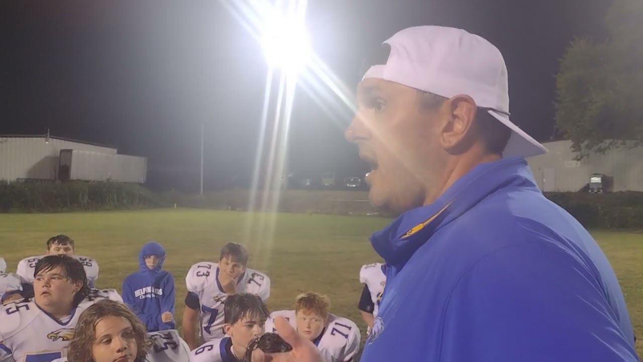 Jacksboro head coach Cody Parker talks to his team after tonight's win over Huntsville