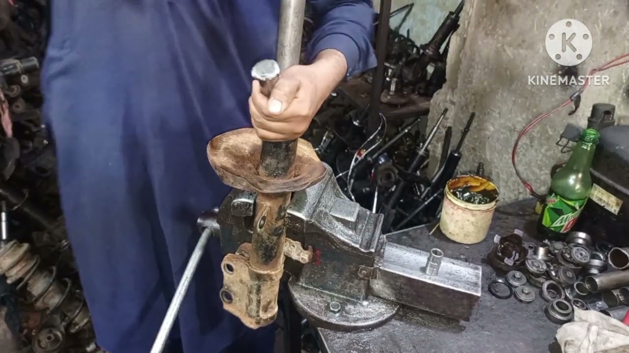 Corolla front shock oil changing and Shock repair pressing