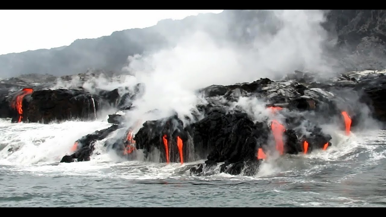 Lava meets the ocean, filmed from a boat on August 28, 2016. (The Big Island of Hawaii)