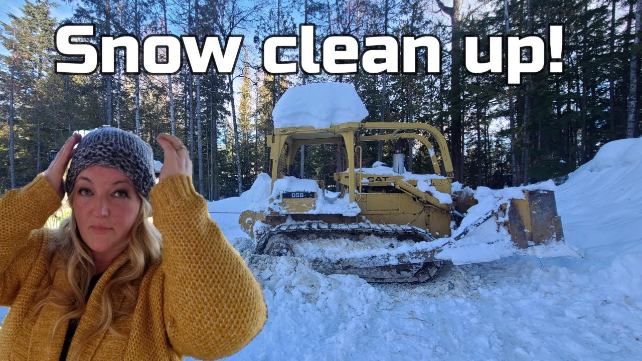 Effortless Winter Cleanup: Pushing snow with a Dozer