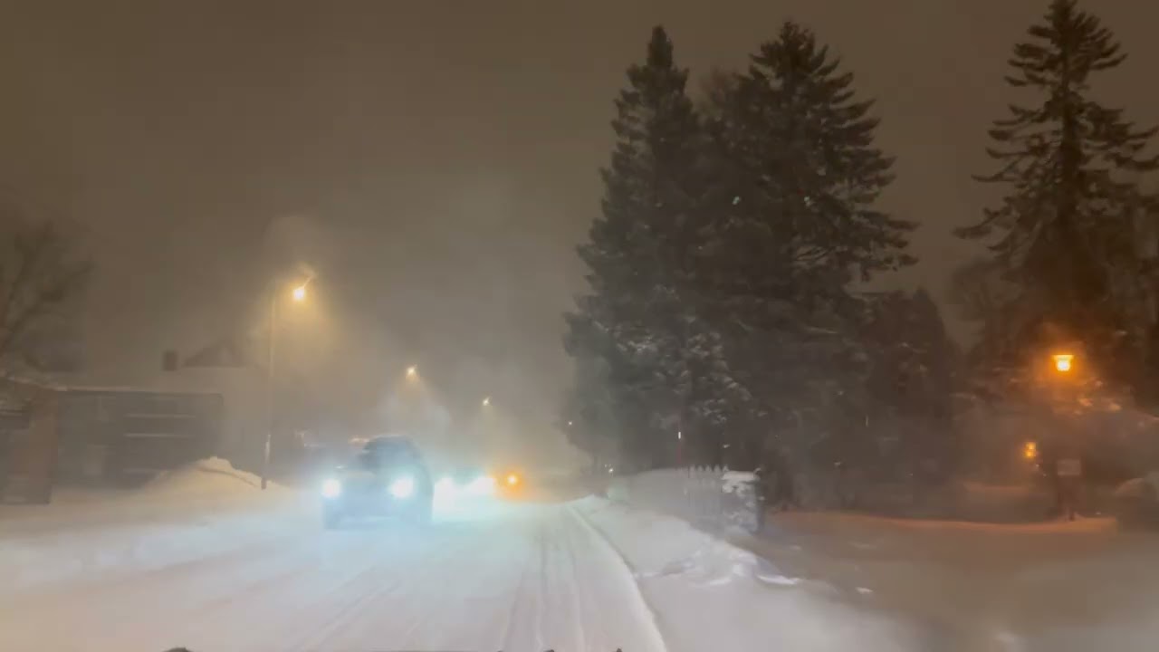 Tromsø from a car window during a storm