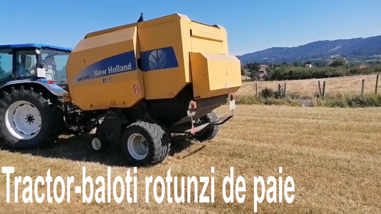 Tractor la cosit iarba din camp🚜Tractor la balotat🌞Baloti rotunzi de paie.