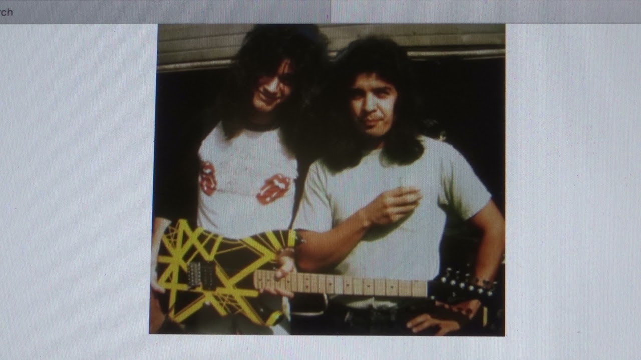 Karl Sandoval / Eddie Van Halen.....the Original EV Black and Yellow striped strat.