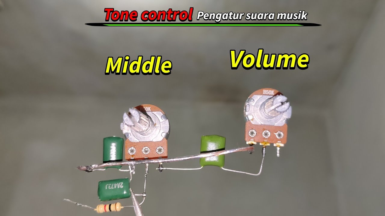 Pengatur suara VOLUME & MIDDLE untuk power amplifier