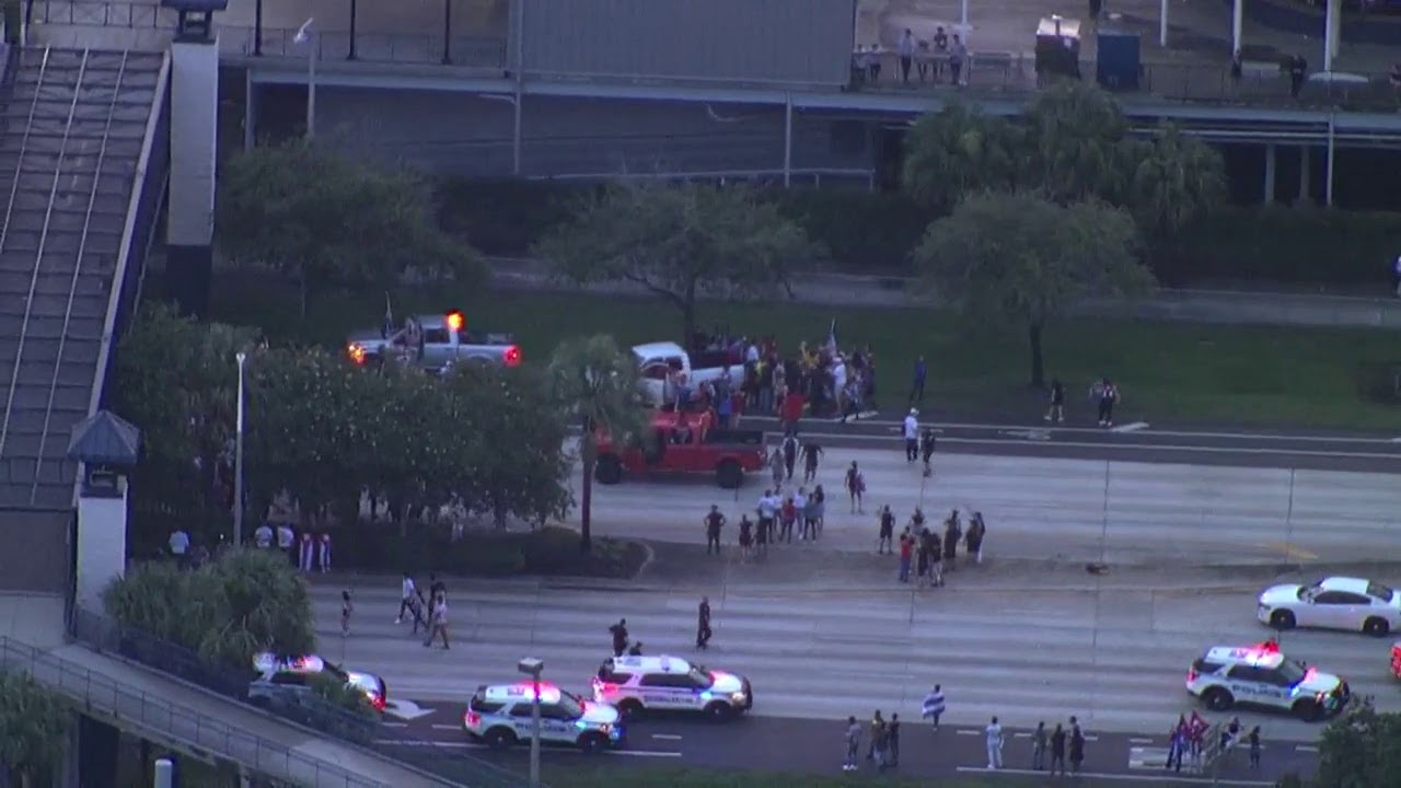 Protesters for Cuba block Dale Mabry Highway in Tampa, Florida