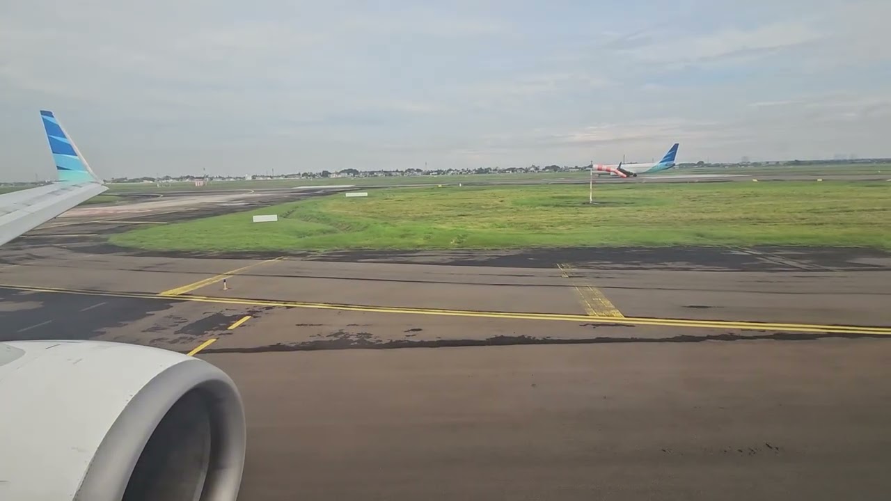 Garuda Indonesia GA 322 taxing to runway 25R