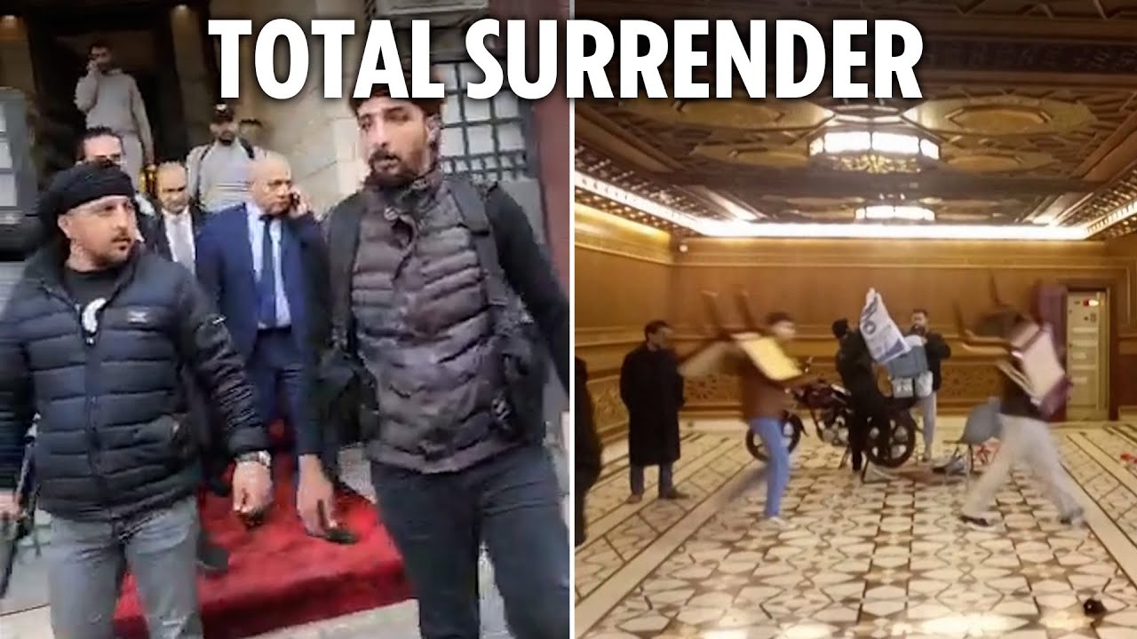 Syrian PM is frogmarched from home by armed rebels to hand over power as locals ransack Assad palace