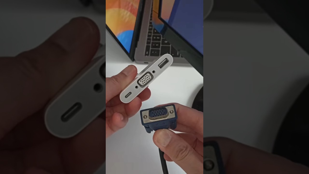 Plug the VGA monitor cable into USB-C multi adapter on Apple MacBook for external display #shorts