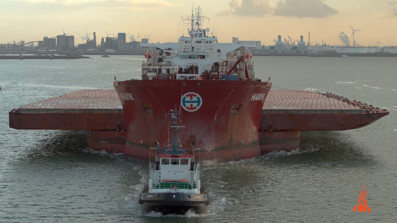 The arrival and discharging of 12 push barges onboard of the semi-submersible hawk