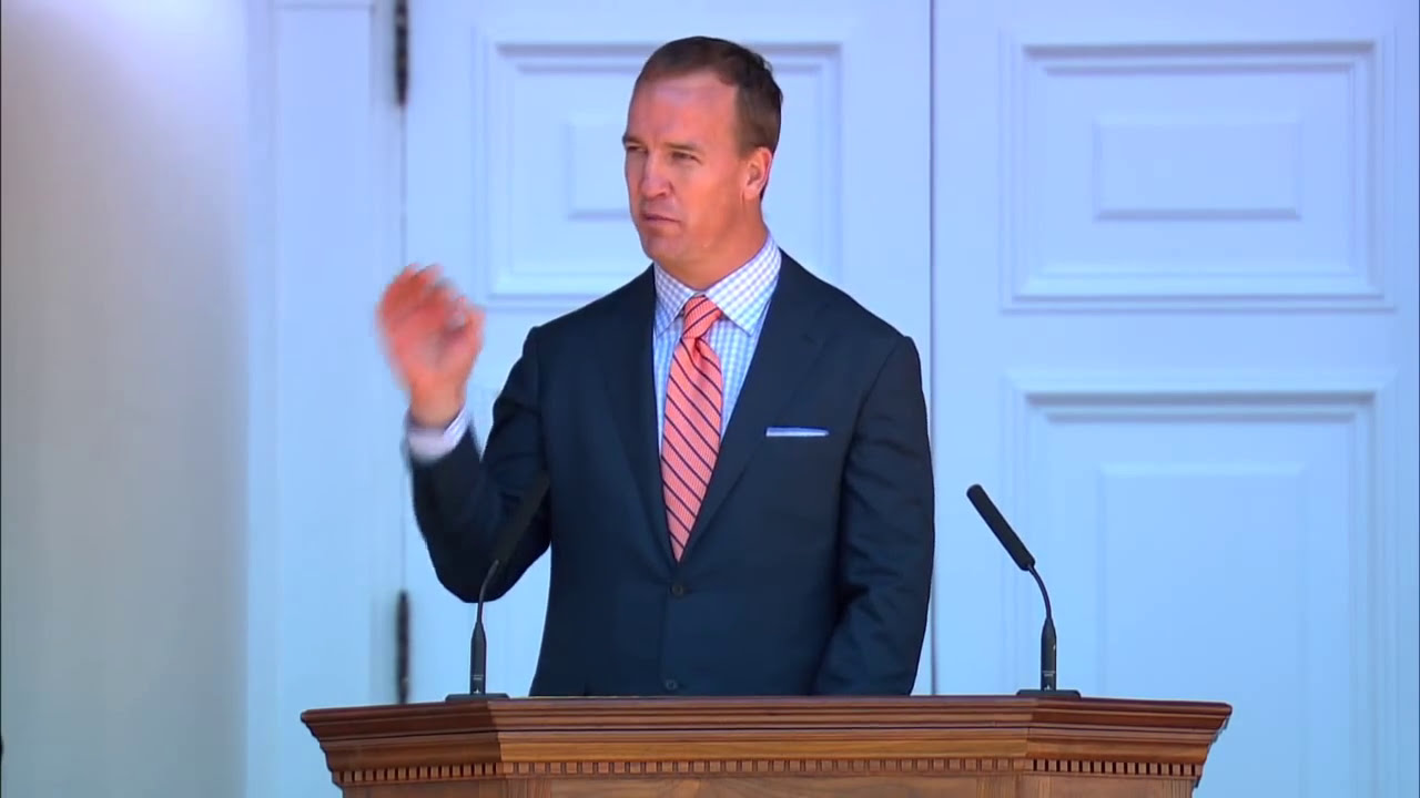 Peyton Manning Passes Footballs and Advice to Graduating Students