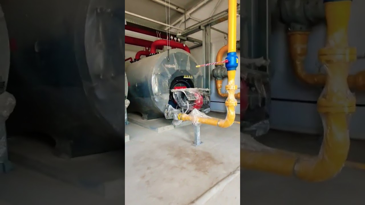Hot water boiler room with VIESSMANN boilers.