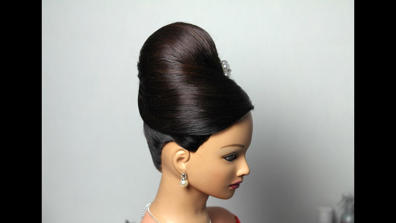 Elegant hairstyle. Bun updo for medium long hair.