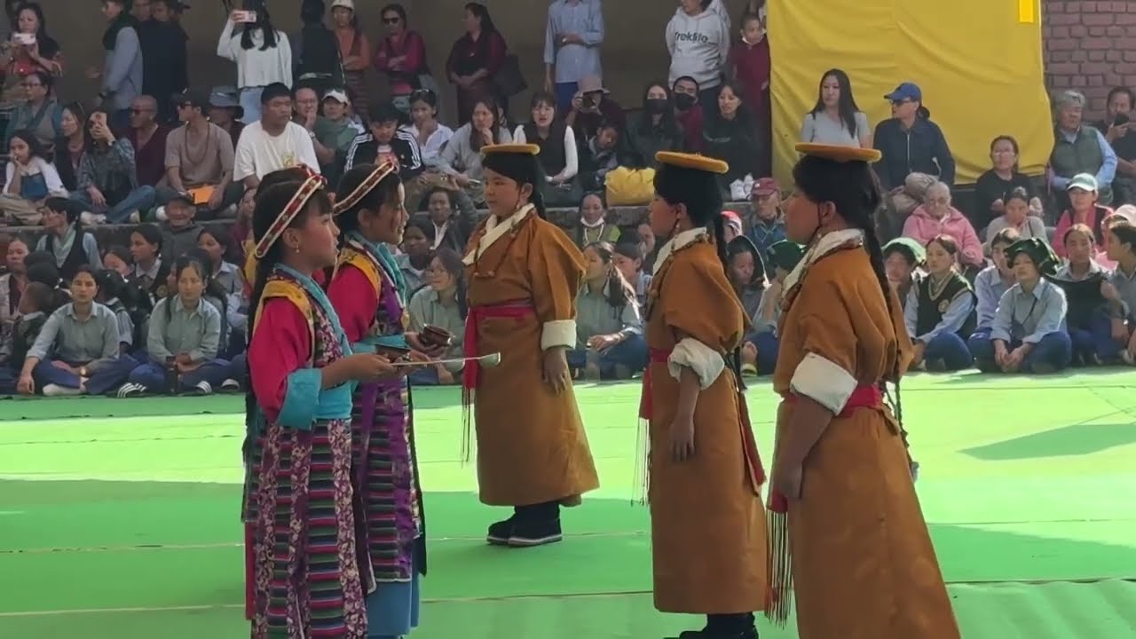 གཙང་གཞས་ཨ་ཅི་གཡུ་ལུ། TCV Day School, McLeod Ganj performance during “TCV 64th Founding Anniversary”