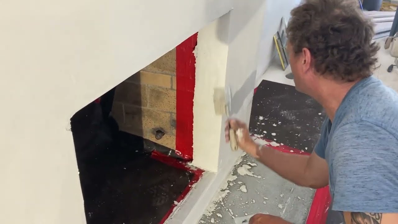 How to do a semi smooth stucco over a brick fireplace Part 2
